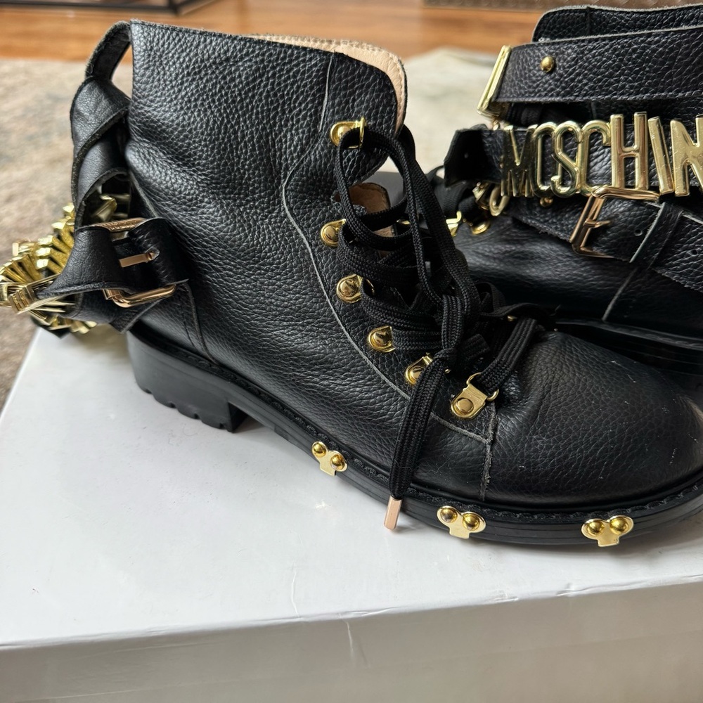 Moschino Black Leather Ankle Boots with Gold Accents - Picture 2 of 5